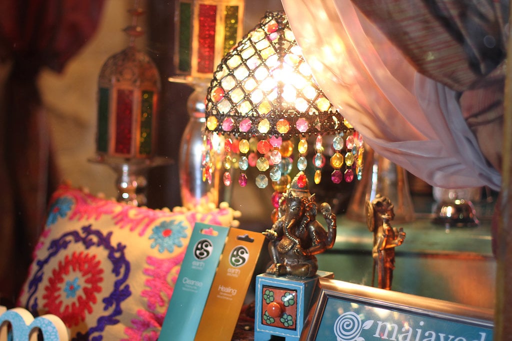 A jewelled lamp and a Ganesh figure in the Maiaveda shop window